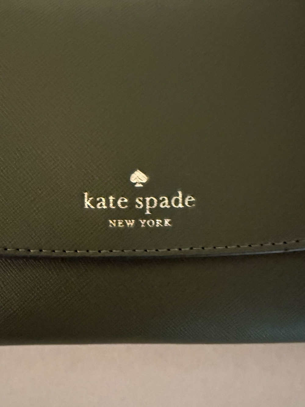 New kate spade New York crossbody bag with gold logo